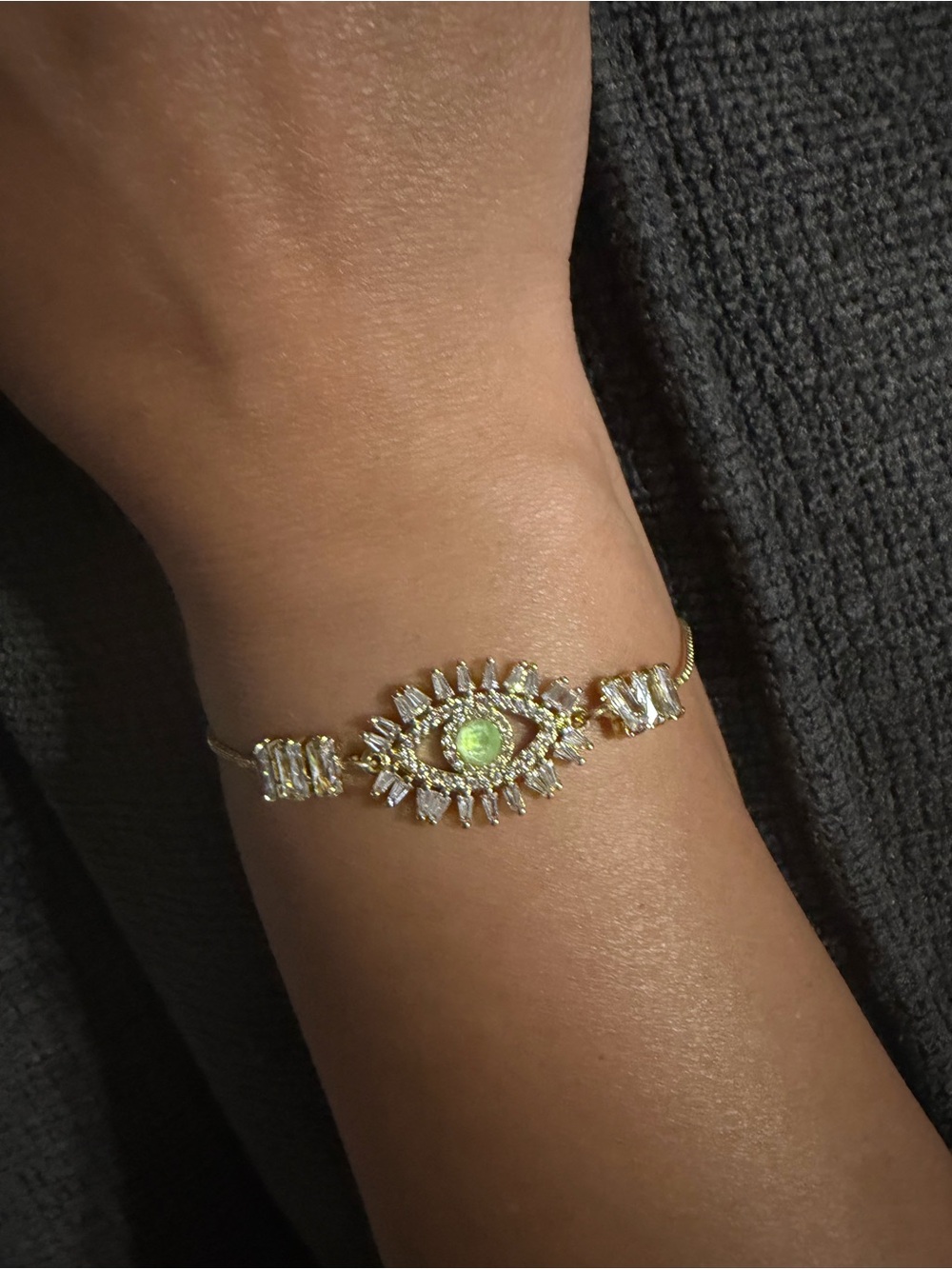 Gold Tone Bracelet with Green Center Gem and Clear Accents